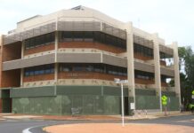 Architect with a blueprint for design